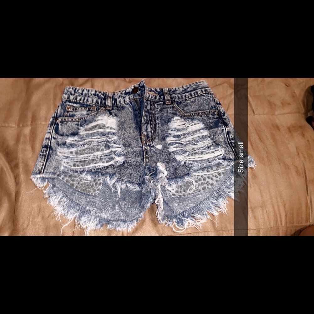 High waisted blue jean shorts